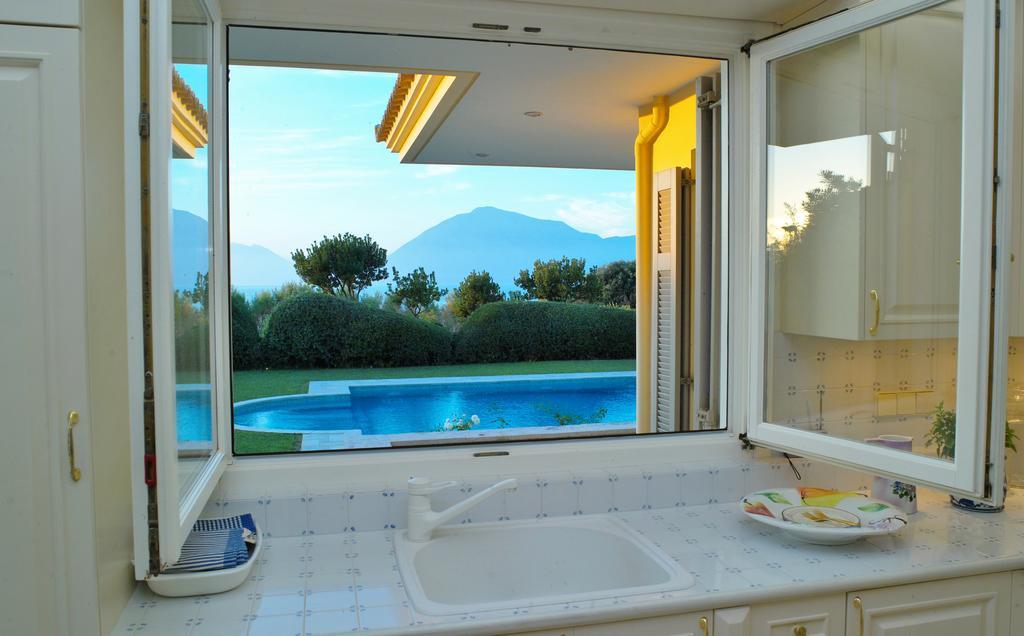 Villa Dh Epavlis Rio Esterno foto