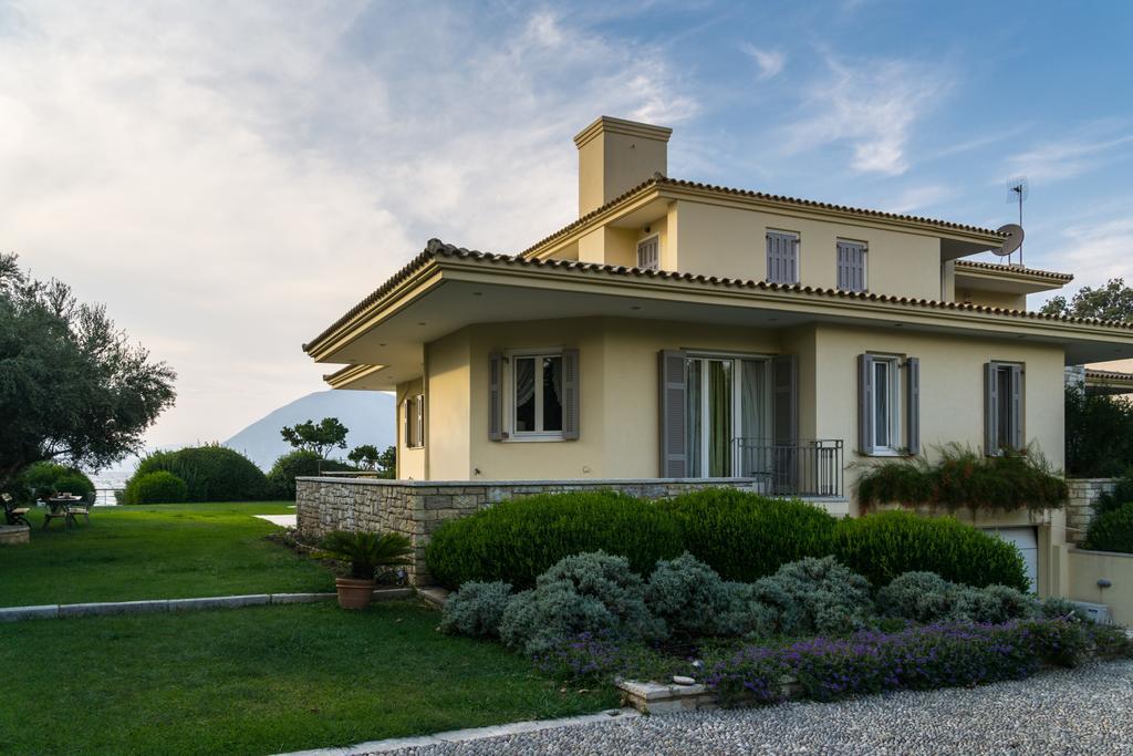 Villa Dh Epavlis Rio Esterno foto
